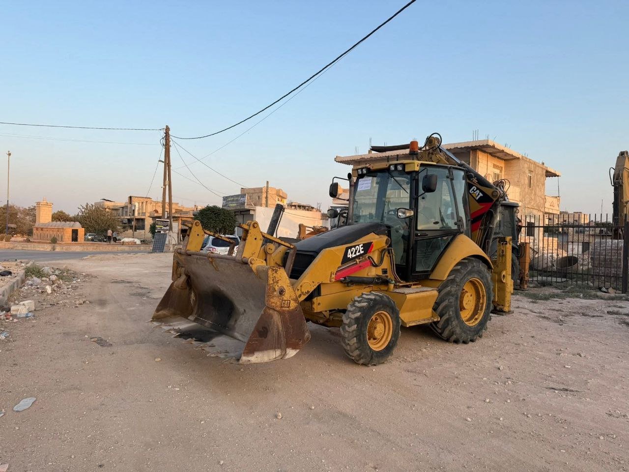 loader + excavators for sale in Syria, Caterpillar 422e loader, 2019 model, located in Idlib, the best site for selling heavy equipment in Syria.