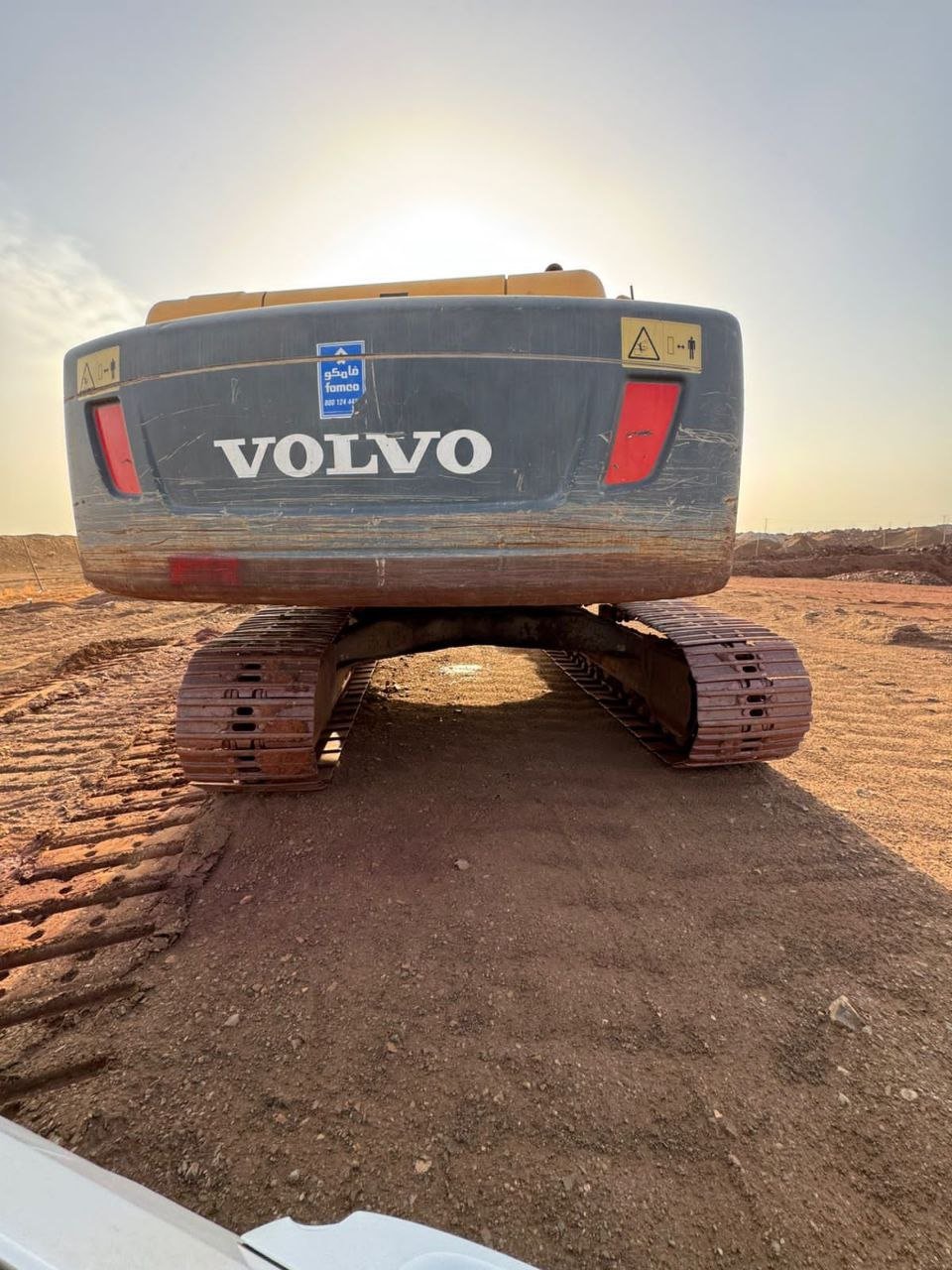 Excavator for sale in Syria, Volvo EC210B model 2014 exported from Saudi Arabia to Syria, the best site for selling trucks and heavy equipment in Syria.