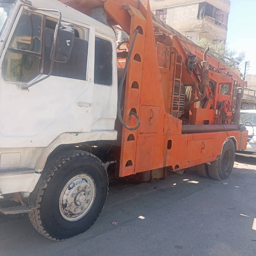 حفار للبيع في سوريا, ميتسوبيشي 140 موديل 2000 تواجد دمشق, أفضل موقع لبيع الشاحنات والمعدات الثقيلة في سوريا